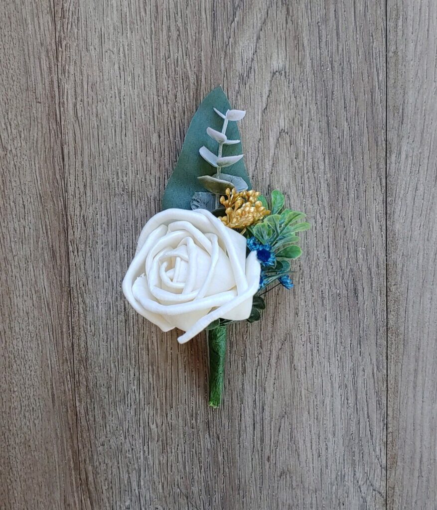 Boutonnieres by Painted Petals, handcrafted sola wood florals, Deltona, Florida
