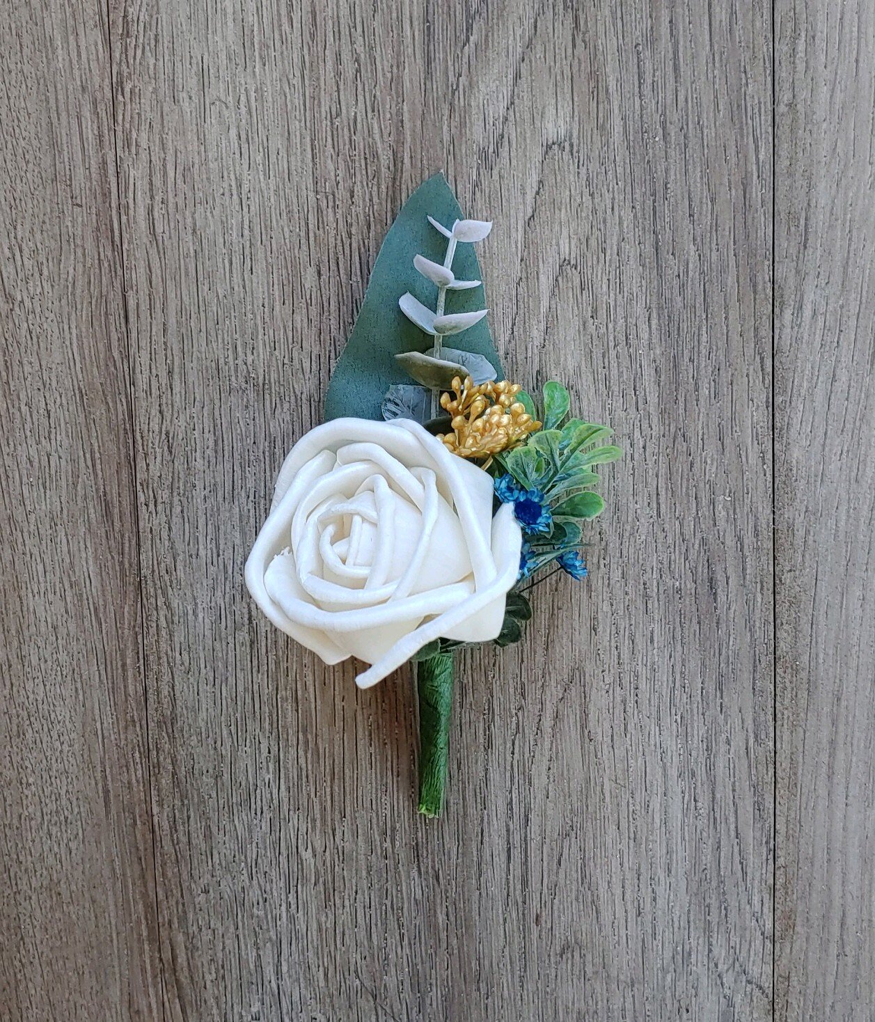Boutonnieres by Painted Petals, handcrafted sola wood florals, Deltona, Florida
